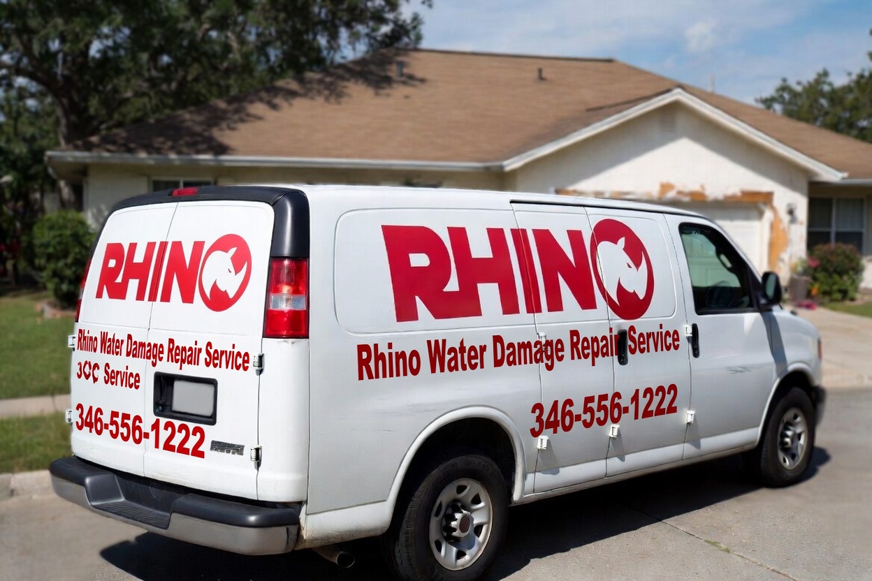 Rhino Water Damage Repair Service fleet van in Houston Texas